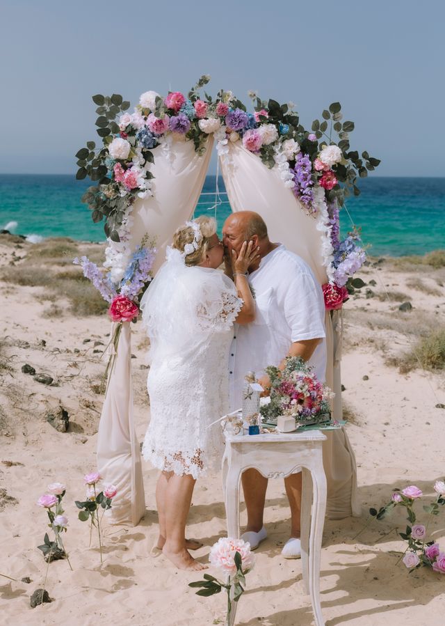 A couple sharing private vows at their dream elopement in Fuerteventura