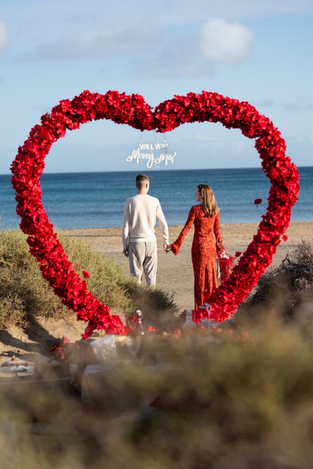 A tender romantic picnic set for two on the beach of Fuerteventura
